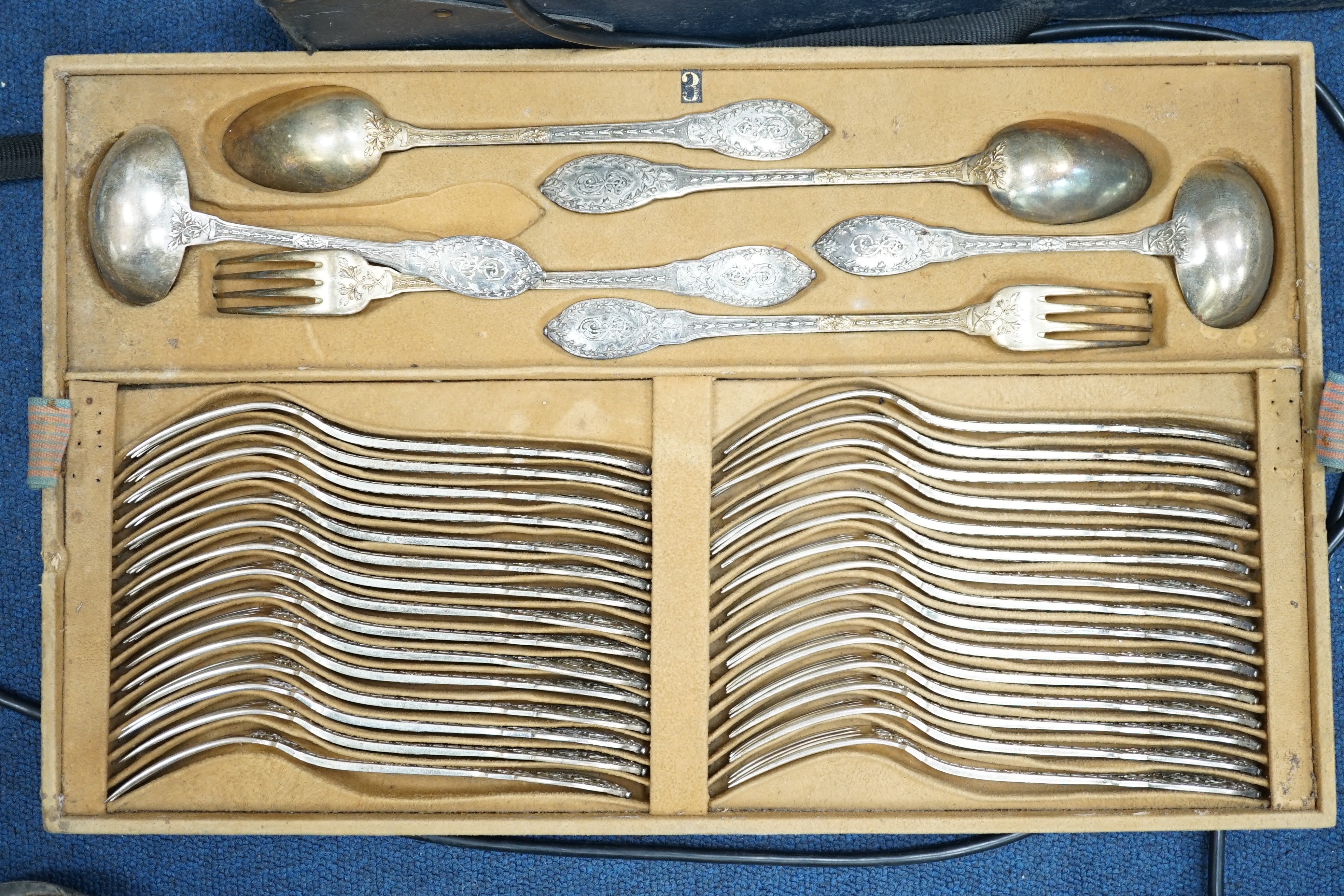 An extensive, almost complete canteen of late 19th/early 20th century French 950 standard silver fancy pattern cutlery, mainly by Gustave Keller of Paris